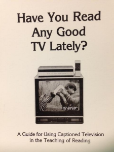 A photo of a captioned TV, the front cover of the National Captioning Institute - Guide for Using Captioned Television in the Teaching of Reading